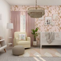 a baby's room with pink and gold wallpaper, a white crib, a beige rocking chair, and a chandelier