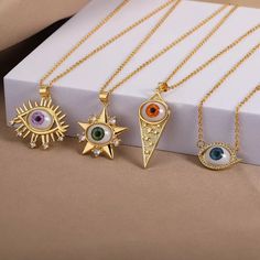 Make a statement with these gold plated 14l evil eye necklace. Decent Jewellery, Store Content Ideas, Necklace Product Photography, Perfume Locket, Mandala Jewelry, Celtic Necklace, Turkish Jewelry, Hand Of Fatima, Eye Pendant