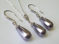 Elegant Silver Drop For Party, Silver Drop Bridal Necklace As Gift, Classic Silver Drop Bridal Necklace, Silver Drop Bridal Necklace Gift, Silver Drop Bridal Necklace For Formal Occasions, Silver Bridal Necklace With Teardrop Elegant Design, Silver Drop Jewelry For Bridesmaid Gift, Silver Teardrop Bridal Necklace With Elegant Design, Formal Silver Pear-shaped Drop Earrings