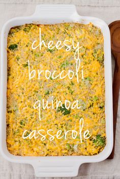 a casserole dish with cheese and broccoli in it