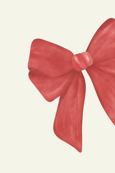 a red bow on a white background