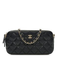 This is an authentic CHANEL Lambskin Quilted Small Clutch With Chain in Black. This stylish wallet is crafted of textured diamond quilted lambskin leather in black. The bag featuresa removable black leather threaded gold chain-link crossbody strap and a gold Chanel CC logo. This bag has two top zippers that open to a burgundy fabric interior with card slot panels. Burgundy Fabric, Gold Chanel, Small Clutch, Leather Thread, Diamond Quilt, Cc Logo, Lambskin Leather, Crossbody Strap, Gold Chain