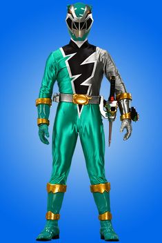 a man in a green and silver power ranger costume standing with his hands on his hips