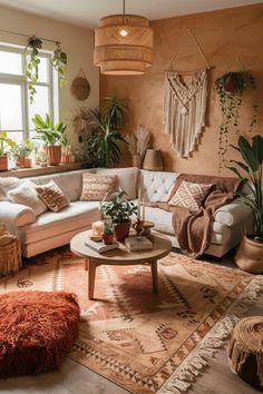 a living room filled with lots of furniture and plants on top of the rugs