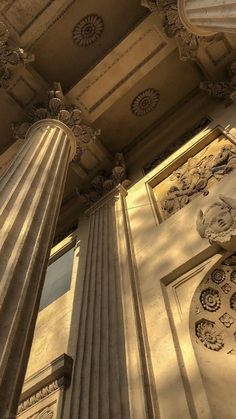 an architectural view of the top and sides of two large pillars with carvings on them