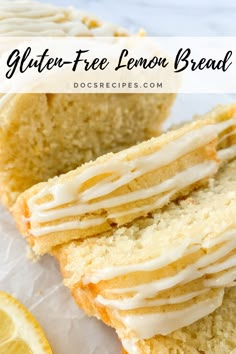 gluten - free lemon bread with white icing on top and sliced lemons in the background