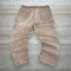 "Vintage Carhartt Double Knees Carpenter Pants Union Made in USA Tan Insane Fade Baggy Fit 90s Skate / Streetwear Condition: 7/10 (work wear marks aka some character) Mens Size: W40\" by L30\" Leg Opening: 9.5\" Thigh Opening: 14\" Front Rise: 13.5\" Shipping is $8 📦 Free Shipping on Bundles! 📦 🔥Check our store for more Shirts, Shoes & Pants!🔥 @depop" Faded Full-length Pants With Pockets, Vintage Relaxed Fit Faded Pants, Vintage Baggy Faded Bottoms, 90s Style Faded Bottoms With Pockets, 90s Style Washed Bottoms With Relaxed Fit, Relaxed Fit 90s Washed Bottoms, 90s Style Relaxed Fit Washed Bottoms, Carhartt Mens Pants, Vintage Hiphop