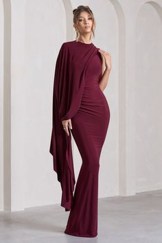 Unveil | Burgundy One-Sleeve Cape Maxi Dress Midi Bridesmaid Dress, Shoulder Cape, Sleek Bun, Small Gold Hoops, Fishtail Skirt, Black Tie Gala, Rich Burgundy, Skirt Maxi, Black Velvet Dress