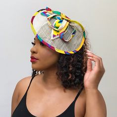 Get a distinctive and elegant look with these African Print fascinator hair clip. Made with Ankara fabric and fine raffia fibers, these handmade colorful African Fascinator will give you a Royal presence to any outfit.The fascinator in tied to the hair via an Alligator Hair Clips*** Also called Ascot Hat, Kentucky Derby Hat, Church Hat, Couture Hat. Origin: Handmade in Cameroon AFRILEGE: The African Privilege Multicolor Headband For Spring, Multicolor Spring Headband, Adjustable Multicolor Headpieces For Summer, Elegant Multicolor Headband, Multicolor Mini Hat Headband For Party, Adjustable Multicolor Headpieces For Spring, Multicolor Headband Fascinator For Party, Multicolor Headband Fascinator For Weddings, Multicolor Headband Costume Hats For Summer