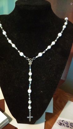 Necklace-26 inches around,32 inches long  cross- 1 inches long 1/2 inches wide beads - 1 cm or smaller ,acrylic ,silver bead caps ,rosary mary,rings,hooks,eye pins Mary Rings, Rosary Mary, Rosary Bead Necklace, White Rosary, Rosary Beads Necklace, Eye Pins, Rosary Beads, Silver Bead, Bead Caps