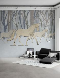 a living room with two horses running in the woods wallpapered on the walls