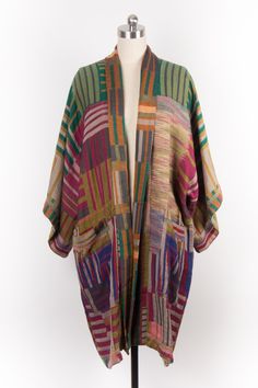 With this Woven Long Cotton Kimono Jacket, you can set the tone for the season! The clothing's 100 percent cotton structure ensures maximum comfort and durability! The two front pockets make it easy to stow knickknacks when out and about. It also goes well with the tried-and-true classics and basics that indeed make up the majority of your wardrobe. Material: 100% Cotton Made In India Casual Multicolor Cardigan With Pockets, Multicolor Cotton Cardigan For Layering, Layered Multicolor Cotton Cardigan, Multicolor Cotton Outerwear For Layering, Multicolor Cotton Outerwear For Fall, Multicolor Relaxed Fit Outerwear With Pockets, Relaxed Fit Multicolor Outerwear With Pockets, Colorful Oversized Outerwear For Fall, Colorful Oversized Fall Outerwear