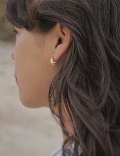 Solid cast hoop earrings with an organic rough textured surface. A nice simple minimal statement earring or for additional piercings layered with other styles. Gold Vermeil (14k gold over sterling silver) made with recycled materials Handmade in the USA using sustainable earth-friendly materials. CARE: Most metals will naturally patina over time, however, there are measures you can take to prolong the life of your jewelry. We recommend removing all jewelry prior to showering, swimming, cleaning, Tarnish Resistant Recycled Gold Huggie Earrings, Minimalist Recycled Gold Huggie Earrings, Everyday Round Huggie Earrings In Recycled Gold, Everyday Recycled Gold Huggie Earrings, Gold Crescent Hoop Earrings For Everyday, Everyday Gold Crescent Hoop Earrings, Minimalist Gold Crescent Cartilage Earrings, Minimalist Single Hoop Earring In Recycled Gold, Everyday Single Earring In Recycled Gold