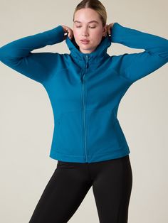 FOR: Medium to high-impact workouts at the gym, studio, or outdoors FEEL: Flex Fleece fabric has a cozy, brushed feel with all-around stretch FAVE: Thumbholes hold sleeves in place and keep warmth in Secure zip pockets to store your essentials Internal pocket to stash essentials Semi-fitted, skims easily over the body Regular length, hits at the hip Body length in size medium: Regular: 25" Petite: 24" Plus: 28" Tall: 27". Sporty Activewear With Pockets For Fall, Fleece Long Sleeve Activewear With Pockets, Winter Athleisure Activewear With Fleece Lining, Sporty Activewear With Fleece Lining For Sports, Long Sleeve Activewear In Recycled Polyester For Outdoors, Recycled Polyester Long Sleeve Activewear For Outdoors, Fleece-lined Athleisure Activewear For Sports, Fall Workout Activewear With Pockets, Sports Fleece Jacket With Ribbed Cuffs