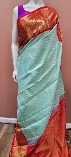 An elegant Kanchi pure Zari Silk Saree w/ a custom Blouse, product ships immediately within US. Blouse customization takes about 2-3 weeks. Ceremonial Semi-stitched Raw Silk Saree, Luxury Semi-stitched Tussar Silk Pre-draped Saree, Luxury Tussar Silk Pre-draped Saree, Luxury Tussar Silk Pre-draped Saree With Zari Weaving, Gold Tussar Silk Pre-draped Saree With Zari Weaving, Silk Saree, 3 Weeks, Silk Sarees, Saree