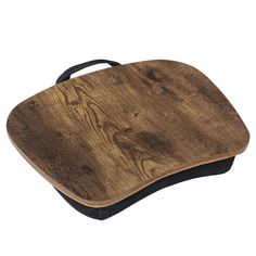 a wooden cutting board with black handles