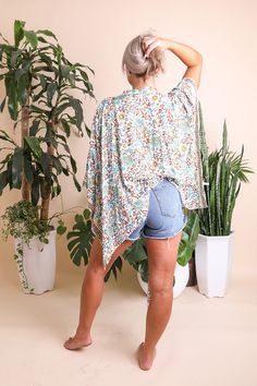 This flattering lightweight versatile floral cuteness is the perfect casual coverup for summer outings. Just pop a bathing suit and a straw sunhat, and you're ready to go! #lovemyleto 100% Viscose Imported Spring Beach Cover-up In Breezy Style, Breezy Relaxed Fit Summer Cover-up, Breezy Spring Cover-up With Relaxed Fit, One Size Summer Beach Cover-up, Beachy Vacation Cover-up With Relaxed Fit, Summer Beach Season Relaxed Fit Cover-up, Beachy Relaxed Fit Cover-up For Vacation, Relaxed Fit Summer Beach Cover-up, Breezy Relaxed Fit Spring Cover-up