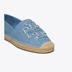 A warm-weather staple is reimagined in soft denim. Detailed with our signature Double T, the slip-on espadrille is perfect to wear at the beach or with the season's midi skirts. Designer Espadrilles, Tory Burch Espadrilles, Tory Burch Flip Flops, Denim Flats, Espadrille Flats, Espadrilles Style, Slip On Espadrilles, Tory Burch Flats, Footwear Design Women