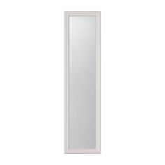 a white door with a mirror on the front and bottom panel, in an empty room