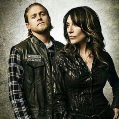 two people standing next to each other in front of a white background with the words sons of anarchy on it