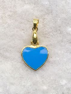 Blue heart- 18K gold plated enamel charm / pendant on spinner. Size - 15 mm / 30 mm. Material- cobalt enamel, 18 K gold plated metal. Stamped - 18K GP ( 18K gold plated) Vintage, never used. All our vintage jewellery and accessories are clean and sanitized. Thank you. MYCOPSHOP - antique/vintage/contemporary art /craft /jewellery /collectable /ephemera . Ship item fast , contact easy, good price , nice finding. Running by JFK. Blue Enamel Locket Jewelry, Yellow Gold Enamel Charms For Gift, Yellow Gold Enamel Heart Charm Jewelry, Gold Enamel Pendant Charms, Gold Enamel Round Pendant Charms, Blue Gold-plated Jewelry With Charms, Blue Gold Plated Jewelry With Charms, Personalized Blue Heart Pendant Jewelry, Blue Heart Charm Round Jewelry