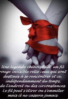 two hands holding each other with a red ribbon tied around the wrist and saying in french