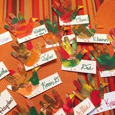 the paper leaves have been made to look like they are being used as place cards