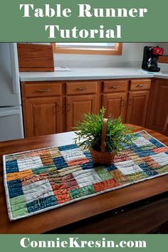 a potted plant sitting on top of a wooden table next to a kitchen counter