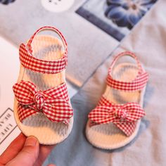 Your little girl will love slipping on these gingham baby girl sandals. Designed with a soft fabric upper, lightweight non-slip sole and easily adjustable elastic straps. These gingham girl sandals are comfortable enough for everyday wear and stylish enough to be worn with pretty dresses and skirts. A must-have for every little bub who's ready to wander. Outsole Material: Rubber Baby Birthday Themes, Toddler Sandals Girl, Kids Dress Wear, Toddler Girl Shoes