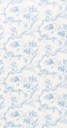 a blue and white wallpaper with flowers on it