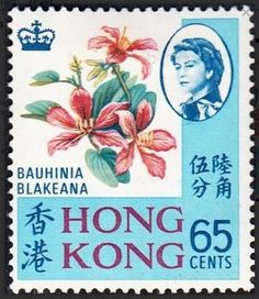 a stamp with an image of a woman and flowers on it's back side