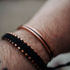 You’ve never seen a cool copper bracelet like this one before. By using pure copper and black vegan cord, this is going to give you its healing powers and still make sure that you can enjoy a true fashionable approach to your understated men’s style.  With just the right thickness and an outlining definition in the copper ends, you’ll be able to wear this with just about anything and it’ll blend right in.  Great for travellers and explorers who need accessories that are up to the challenge, this Mens Copper Bracelet, Mens Accessories Bracelet, Bezel Bracelet, Gifts For Hubby, Copper Anniversary Gifts, Black Vegan, Unique Bracelets, Copper Bracelet, Healing Powers