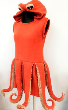 an orange octopus costume on a mannequin