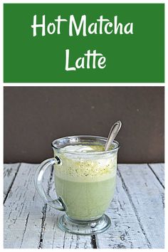 hot matcha latte in a glass mug with a spoon on the side and text overlay that reads, hot matcha latte