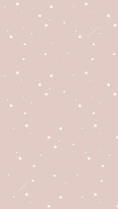 a pink wall with white stars on it