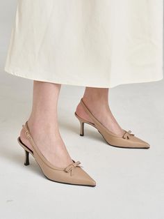 Hailey is a handmade shoe brand that prioritizes a comfortable fit that can be worn anytime, anywhere.- Feminine mood point toe slingback- Adjustable buckle strap on the ankle- Lovely ribbon decoration as a point- Comfortable to wear Elegant Spring Slingback Pumps With Strap, Chic Slingback Sandals With Pointed Toe, Slingback Pumps With Strap For Spring, Beige Slingback Pumps With Buckle, Chic Pointed Toe Slingback Sandals With Strap, Spring Slingback Pumps With Strap, Chic Slingback Sandals With Pointed Toe And Heel Loop, Pointed Toe Slingback Pumps With Strap, Beige Slingback Pumps With Ankle Strap And Buckle Closure