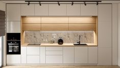 an empty kitchen with white cabinets and marble counter tops, along with a window above the sink