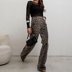 Introducing our trendy and bold high waist leopard print straight pants, perfect for those who love to make a statement with their streetwear style! These pants are made of 100% pure cotton, providing both comfort and breathability for all-day wear. Whether you're running errands or going to work, these pants are versatile enough to wear for any occasion. The straight leg cut provides a flattering silhouette, while the high waist design elongates your legs for a taller appearance. The leopard pr Casual Leopard Print Straight Leg Bottoms, Trendy Leopard Print Pants For Fall, Leopard Print Cotton Pants For Spring, Cotton Leopard Print Pants For Spring, Fall Straight Leg Leopard Print Pants, Wide Leg Cotton Bottoms In Leopard Print, Casual High Waist Leopard Print Pants, Trendy Leopard Print Bottoms For Fall, Casual Leopard Print Pants For Work