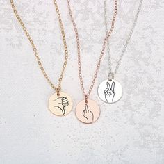 Treat your loved ones to something totally unique, totally creative, and totally YOU - the Hand Gestures Necklace. The perfect gift to let your friends and family know how much they truly mean to you! The coolest gift ever! Perfect for sharing your love with friends, sisters, and besties, our signature disc necklace features unique, hand-drawn expressions of sign language, designed by Melanie. Show your special someone just how much you care with a one-of-a-kind sign like 'I love you', 'peace', Drawn Expressions, Hand Gestures, 20 Inch Necklace, Like I Love You, Hand Gesture, Princess Necklace, Heart Face Shape, Month Gifts, Wear Necklaces