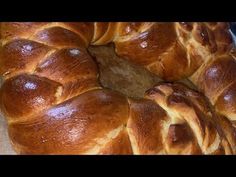 a large braided loaf of bread sitting on top of a table