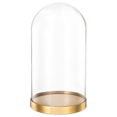 a glass clochet with gold rim and metal base on an isolated white background