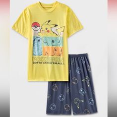 Boys' Pokemon 2pc Short Sleeve Top And Shorts Pajama Set - Yellow/Navy Blue New With Tags Medium Yellow Cotton Sleepwear With Cartoon Print, Casual Yellow Bedtime Sets, Casual Yellow Pajama Party Sets, Yellow Casual Sets For Pajama Party, Casual Yellow Sets For Pajama Party, Yellow Relaxed Fit Loungewear Sets, Casual Yellow Loungewear Set, Yellow Relaxed Fit Lounge Sets, Playful Yellow Sleepwear For Pajama Party