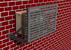 a red brick wall with a metal grille on it's side next to a black frame