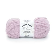 a ball of yarn that is pink and has the words feels like bliss on it