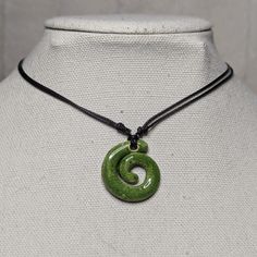 Handmade Spotted Bright Green Large Ceramic Spiral Pendant Y2k Style Boho Hippie Whimsical Choker Adjustable Black Corded Necklace Clay Charms Jewelry. These Are Made By Hand, Glazed And Kiln Fired. Color And Design May Vary Slightly As These Are Handmade. Comes On An Adjustable Waxed Black Cord Necklace. Necklace Is Adjustable From Approximately 14" To 28". To Wear Your Necklace Pull The Two Knots Away From The Pendant To Adjust To A Larger Size, Leave About An Inch Of Space Between The Two Kno Casual Green Necklace, Necklace Clay, Ceramic Charms, Ceramic Pendant Necklace, Corded Necklace, Cord Choker, Spiral Pendant, Black Cord Necklace, Ceramic Necklace