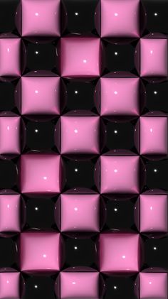 a black and pink checkered wall with lots of cubes on it's sides