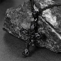 Catholic Christ stainless steel Crucifix cross necklace for men, display your faith wherever you go. Made of 316L stainless steel, which will last for a long time. Packed in a delicate box. Inspirational jewelry for family members or friends who are going through rough times.  SPU:  TP60058  Collection:  Religious  Material：Stainless Steel  Pendant:  50mm*31.9mm  Chain Length:  22+2 inches  Weight: 23.4g  Clean it with a soft dry cloth.  Keep away from water and chemicals.  Avoid wearing it when Black Stainless Steel Crucifix Necklace, Cheap Men's Cross Pendant Jewelry, Luxury Men's Crucifix Necklace, Cross Necklace For Men, Men’s Crucifix Necklace, Nickel-free Stainless Steel Crucifix Necklaces, Rough Times, Nordic Vikings, Viking Symbols