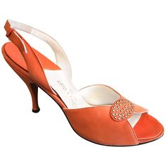 Brand new, never worn 50s vintage MACKEY STARR sorbet orange peep toe slingback high heel shoes! Features rhinestones at the toe. Adjustable sling back strap. Leather sole. Great with shorts, jeans, a skirt or a dress. In great unworn condition. Very well made. Measures like a Size 6 N Measurements: 8.75 inches from inner toe to heel 1950s Shoes, Century Shoes, Vintage High Heels, Historical Shoes, Orange Shoes, Strappy High Heels, Slingback Heels, Retro Shoes, Saddle Leather