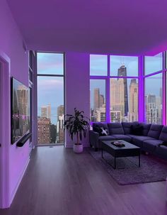 a living room filled with furniture and large windows covered in purple lighting next to a cityscape