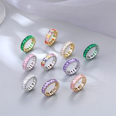 six different colored rings sitting next to each other